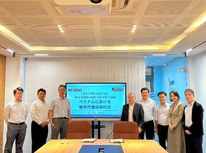 Attendees at the signing ceremony